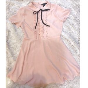Blush dress with black ribbon